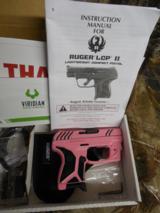RUGER
LCP II,
WITH
VIRIDIAN
RED
LASER, &
CARRING
POUCH,
380
ACP,
PINK / BLACK
CUSTOM
CERAKOTING,
6+1
ROUND
MAGAZINE,
NEW
IN
BOX. - 1 of 20