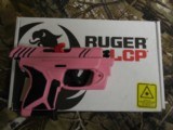 RUGER
LCP II,
WITH
VIRIDIAN
RED
LASER, &
CARRING
POUCH,
380
ACP,
PINK / BLACK
CUSTOM
CERAKOTING,
6+1
ROUND
MAGAZINE,
NEW
IN
BOX. - 14 of 20