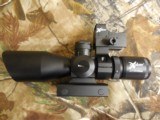 OPTIC
EXPLORE,
TWO
SCOPES
IN
ONE,
BIG
BORE
RIFLESCOPE,
RED, GREEN,
2.5-10X40 MM,
BALLISTIC
KNOB
100 TO
500 YARDS. +
MICRO
DOT SIGHT - 7 of 15