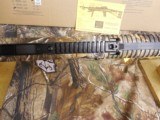 HI-POINT
1095TS,
REALTREE
EDGE
10 - M M
CARBINE, 10
ROUND
MAGAZINE,
17.5"
BARREL,
Raised soft rubber cheek-piece,
FACTORY
NEW
IN
B - 13 of 19