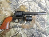 HERITAGE
R.R.
22
L. R. /
22
MAGNUM,
REVOLVER,
9
SHOT,
"" TWO
CYLINDERS. ""
RED
GRIPS,
6.5"
BARREL,
FA - 5 of 23