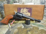HERITAGE
R.R.
22
L. R. /
22
MAGNUM,
REVOLVER,
9
SHOT,
"" TWO
CYLINDERS. ""
RED
GRIPS,
6.5"
BARREL,
FA - 3 of 23