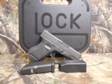 GLOCK
G-27
GENERATION - 3,
WHITE
SIGHTS,
PRE
OWNED,
3.5"
BARREL, 1-11 & 1-9
ROUND
MAGAZINE,
AND
GLOCK
PLASTIC
HARD
CASE. WITH
M - 3 of 18