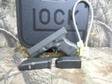 GLOCK
G-27
GENERATION - 3,
WHITE
SIGHTS,
PRE
OWNED,
3.5"
BARREL, 1-11 & 1-9
ROUND
MAGAZINE,
AND
GLOCK
PLASTIC
HARD
CASE. WITH
M - 4 of 18