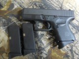 GLOCKG-27GEN4,PEOWNED,LIKENEW, 40 S & W,3.42" BARREL,WHITEOUTLINESIGHTS,3- 11+1 MAGS., Black Interchangeable Backstrap, - 6 of 20