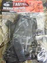 UTG
TACTICAL
PADDED
SHOLDER
HOLSTER,
WITH
TWO
MAGAZINES
HOLDERS,
BLACK,
UNIVERAL
HORIZONTAL,
FACTORY
NEW - 1 of 14