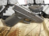 GLOCK
G-23,
GEN - 3,
40 S&W
PREOWNED,
EXCELLENT
CONDITION,
3 - 13
ROUND
MAGAZINES,
WHITE
OUT LINE
SIGHTS,
GLOCK
PLASTIC
CASE - 14 of 22