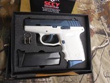 SCCY
CPX2,
CUSTOM
STING-RAY / WHITE,
9-MM,
2 - 15 ROUND
MAGAZINES,
COMBAT
SIGHTS,
FACTORY
NEW
IN
BOX - 2 of 17