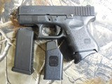 GLOCK
G-27
GENERATION - 3, NIGHT
SIGHTS,
PRE
OWNED, ALMOST
NEW
GREAT,
3.5"
BARREL, 2 - 9 + 1
ROUND
MAGAZINES,
AND
GLOCK
HARD
CAS - 6 of 19