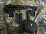 KEL-TEC
SUB-2000, GLK-17,
9 - MM,
BLACK,
USES
GLOCK
MAGAZINES.
FOLDING
RIFLE,
COMES
WITH ONE
17
ROUND
MAGAZINE,
FACTORY
NEW
IN
BOX - 22 of 25