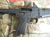KEL-TEC
SUB-2000, GLK-17,
9 - MM,
BLACK,
USES
GLOCK
MAGAZINES.
FOLDING
RIFLE,
COMES
WITH ONE
17
ROUND
MAGAZINE,
FACTORY
NEW
IN
BOX - 8 of 25