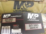 SHOOTING
MAT,
S&W - M&P,
DUTY
SERIES,
TAN,
ROLLED OUT MAT IS 74