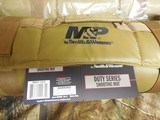 SHOOTING
MAT,
S&W - M&P,
DUTY
SERIES,
TAN,
ROLLED OUT MAT IS 74