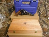 SMITH & WESSON,
DIRTY
HARRY,
MODLE
29-10,
44
MAGNUM,
COCOBOLO WOOD
GRIPS,
6.5"
BARREL ,COMES
WITH Wooden Display Case,
FACTORY
NEW I - 6 of 25