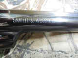 SMITH & WESSON,
DIRTY
HARRY,
MODLE
29-10,
44
MAGNUM,
COCOBOLO WOOD
GRIPS,
6.5"
BARREL ,COMES
WITH Wooden Display Case,
FACTORY
NEW I - 11 of 25