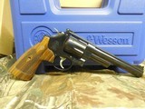 SMITH & WESSON,
DIRTY
HARRY,
MODLE
29-10,
44
MAGNUM,
COCOBOLO WOOD
GRIPS,
6.5"
BARREL ,COMES
WITH Wooden Display Case,
FACTORY
NEW I - 5 of 25