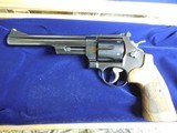 SMITH & WESSON,
DIRTY
HARRY,
MODLE
29-10,
44
MAGNUM,
COCOBOLO WOOD
GRIPS,
6.5"
BARREL ,COMES
WITH Wooden Display Case,
FACTORY
NEW I - 17 of 25