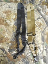 SLING,
SINGLE
POINT
BUNGEE
RIFLE
SLING,
TAN
OR
BLACK,
FOR
AR-15,
NEW
IN
PACKAGE - 1 of 11
