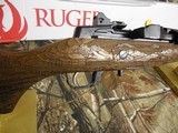 RUGER MINI 14, ENGRAVED LIMITED EDITION OF 750 MADE, 223/5.56,
5-ROUND MAGAZINES, ADJUSTABLE
SIGHTS, SCOPE RINGS INCLUDED, & EXTRA TAPCO STOCK - 5 of 23