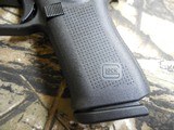 GLOCK
48,
THE JUST OUT GLOCK 48,
9-MM
LUGER FS 10-SHOT BLACK FRAME SILVER SLIDE,
2- MAGAZINES,
4"
BARREL,
FACTORY
NEW
IN
BOX. - 10 of 22