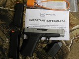 GLOCK
48,
THE JUST OUT GLOCK 48,
9-MM
LUGER FS 10-SHOT BLACK FRAME SILVER SLIDE,
2- MAGAZINES,
4"
BARREL,
FACTORY
NEW
IN
BOX. - 14 of 22