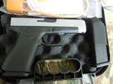 GLOCK
48,
THE JUST OUT GLOCK 48,
9-MM
LUGER FS 10-SHOT BLACK FRAME SILVER SLIDE,
2- MAGAZINES,
4"
BARREL,
FACTORY
NEW
IN
BOX. - 2 of 22