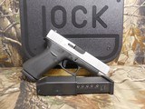 GLOCK
48,
THE JUST OUT GLOCK 48,
9-MM
LUGER FS 10-SHOT BLACK FRAME SILVER SLIDE,
2- MAGAZINES,
4"
BARREL,
FACTORY
NEW
IN
BOX. - 3 of 22