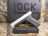 GLOCK
48,
THE JUST OUT GLOCK 48,
9-MM
LUGER FS 10-SHOT BLACK FRAME SILVER SLIDE,
2- MAGAZINES,
4"
BARREL,
FACTORY
NEW
IN
BOX. - 4 of 22