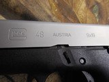 GLOCK
48,
THE JUST OUT GLOCK 48,
9-MM
LUGER FS 10-SHOT BLACK FRAME SILVER SLIDE,
2- MAGAZINES,
4"
BARREL,
FACTORY
NEW
IN
BOX. - 7 of 22