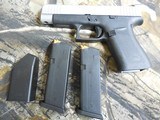 GLOCK
48,
THE JUST OUT GLOCK 48,
9-MM
LUGER FS 10-SHOT BLACK FRAME SILVER SLIDE,
2- MAGAZINES,
4"
BARREL,
FACTORY
NEW
IN
BOX. - 13 of 22