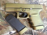 GLOCK G-30, 45 ACP,
COMPACT,
GEN-3,
NIGHT
SIGHTS,
2 -10
ROUND
MAGAZINES,
ALMOST
NEW,
JUST
CUSTOM CERAKOTED
IN
GREEN / GOLD
SCORPION - 3 of 23