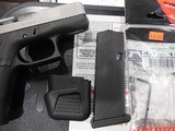 GLOCK
G-43X,
9-MM,
2- 10 + 1
ROUND
MAGAZINES,
SILVER
SLIDE,
BLACK
FRAME,
WHITH
COMBAT
SIGHTS,
FACTORY
NEW
IN
BOX .. - 18 of 25