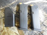 GLOCK
G-43X,
9-MM,
2- 10 + 1
ROUND
MAGAZINES,
SILVER
SLIDE,
BLACK
FRAME,
WHITH
COMBAT
SIGHTS,
FACTORY
NEW
IN
BOX .. - 13 of 25