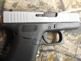 GLOCK
G-43X,
9-MM,
2- 10 + 1
ROUND
MAGAZINES,
SILVER
SLIDE,
BLACK
FRAME,
WHITH
COMBAT
SIGHTS,
FACTORY
NEW
IN
BOX .. - 7 of 25