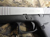 GLOCK
G-43X,
9-MM,
2- 10 + 1
ROUND
MAGAZINES,
SILVER
SLIDE,
BLACK
FRAME,
WHITH
COMBAT
SIGHTS,
FACTORY
NEW
IN
BOX .. - 8 of 25