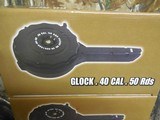 GLOCK
40-S&W,
50
ROUND
DRUM,
FITS
GLOCK
G-22,
G-23,
G-35
THIS MAGAZINE FITS DOUBLE STACK MAGAZINE,
FACTORY
NEW
IN
BOX - 2 of 18