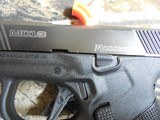 MOSSBERG
MC1S,
9-MM,
PISTOL,
COMPACT,
WITH
MANUAL SAFETY,
2-7 ROUND
MAGAZINES,
3.4"
BARREL,
COMBACT
SIGHTS,
FACTORY
NEW
IN
BOX. - 8 of 21