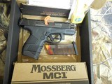MOSSBERG
MC1S,
9-MM,
PISTOL,
COMPACT,
WITH
MANUAL SAFETY,
2-7 ROUND
MAGAZINES,
3.4"
BARREL,
COMBACT
SIGHTS,
FACTORY
NEW
IN
BOX. - 3 of 21