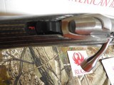 RUGER
AMERICAN
TARGET, # 08368,
22- MAGNUM,
BOLT ACTION,
STAINLESS
STEEL, W / SCOPE,
18"
BARREL,
9+1 ROUND MAGAZINE,
FACTORY
NEW
IN - 12 of 26