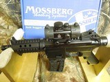 Mossberg 715P Pistol -This fun .22 pistol is lightweight, easy to shoot, and perfect for small game, plinking, target shooting
WITH RED DOT SIGHT . - 4 of 24