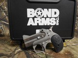 DERRINGER,
BOND
ARMS
ROUGH N ROWDY,
9 - MM,
2.5" BARREL,
STAINLESS
STEEL,
RUBR
GRIP,
FACTORY
NEW
IN
BOX - 4 of 19