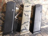 GLOCK
G-22
GEN.-4,
CUSTOM
CAMO,
ALMOST
NEW, ( SEE PIC. )
3 - 15
ROUND
MAGAZINES,
NIGHT
SIGHTS,
GLOCK
CASE & MANUAL,
GREAT
GLOCK - 12 of 21