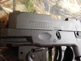 Taurus
1G2S931VL G2S, with
Viridian
Laser,
9-MM.
3.25" BARREL.
7+1 ROUND
MAGAZINE,
Black
Polymer
Grip
Black
Frame Black Carbon Steel - 6 of 21