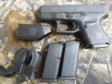 GLOCK
G-26,
GEN-4,
9-MM,
3 - 10
ROUND
MAGAZINES,
WHITE
OUTLINE
SIGHTS,
Interchangeable
Backstrap
Grip, 3.4"
BARREL
FACTORY
NEW
IN - 6 of 21