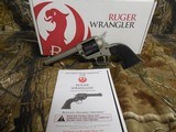 RUGER
# 2003
SILVER
CERAKOTE,
Wrangler
Revolver
Single,
22 LR,
4.62"
BARREL,
6 ROUND
Black
Synthetic
Grip,,
FIXED
SIGHTS NEW IN - 4 of 19