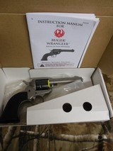 RUGER
# 2003
SILVER
CERAKOTE,
Wrangler
Revolver
Single,
22 LR,
4.62"
BARREL,
6 ROUND
Black
Synthetic
Grip,,
FIXED
SIGHTS NEW IN - 1 of 19