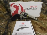 RUGER
# 2003
SILVER
CERAKOTE,
Wrangler
Revolver
Single,
22 LR,
4.62"
BARREL,
6 ROUND
Black
Synthetic
Grip,,
FIXED
SIGHTS NEW IN - 3 of 19