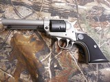 RUGER
# 2003
SILVER
CERAKOTE,
Wrangler
Revolver
Single,
22 LR,
4.62"
BARREL,
6 ROUND
Black
Synthetic
Grip,,
FIXED
SIGHTS NEW IN - 8 of 19