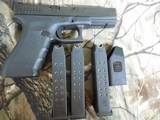 GLOCK G-22, GENERATION -4,
MADE IN AUSTRIA,
PRE OWNED, AS CLOSE TO NEW AS YOU CAN GET, ALL PAPERS, GLOCK CASE, NIGHT SIGHTS, 3-15+1
ROUND
MAGS, - 7 of 21
