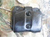 DESANTIS, DOUBLE MAGAZINE POUCH,
LEATHER,
GLOCK 42
BLACK,
HOLDS
TWO
SINGLE
MAGAZINES,
WORKS
ON
A LOT
OF
SINGLE
380
MAGS, - 3 of 14